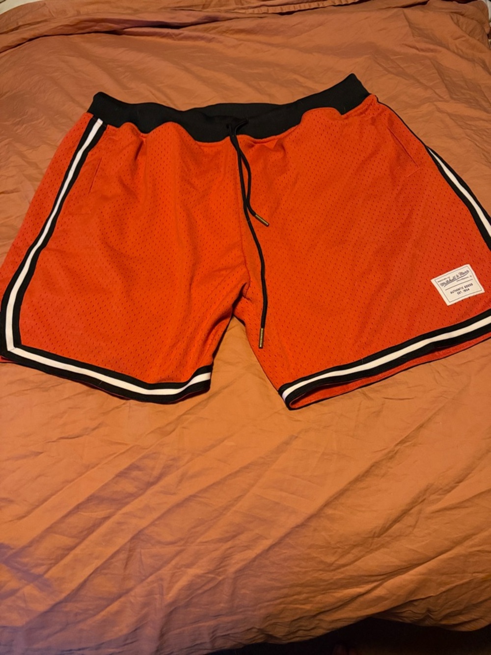 Mitchell & Ness Orange Mesh Athletic Shorts with Black & White Trim